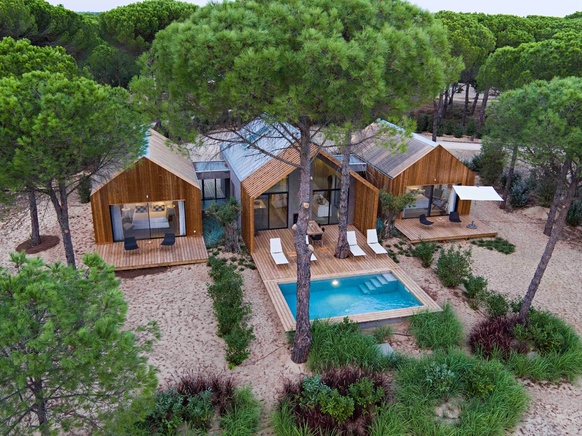 Aerial view of the estate with the villa in its own clearing